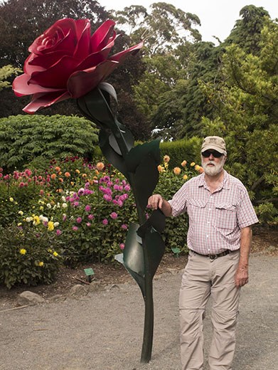 Bill by the rose at the Botanic Garden
