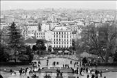 From the entrance of Sacré Coeur, Paris's expanse seems infinite. Many visitors scurry down the steps towards the center of Montmartre, while others stop to wonder at the rooftops.: by claires, Views[356]