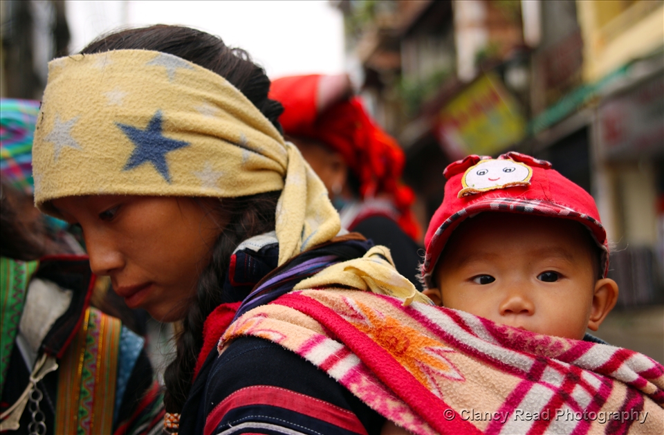 The lady in the photo is 20 years old, she carries her baby everywhere