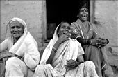 Neighbours enjoy each other's company, while sitting outside one of their mud-fabricated houses in Asade village. Baibai, on the left side, has been elected as the head of her community, despite belonging to the lowest caste.: by clarafigueras, Views[783]