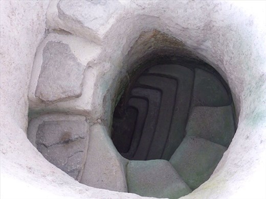 Steps down into underground tomb