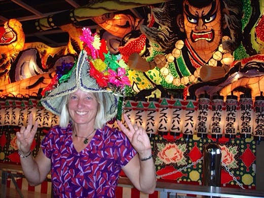 Wearing traditional hat in Aomori