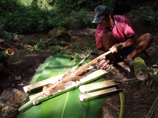 Our hill-tribe host cooks lunch the traditional way