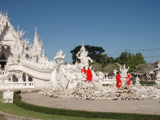 Buddhist monks create a splash of colour at the White Temple