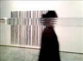 (2) In the Museum of Contemporary Art in Sydney, a nearby glass exhibition case creates a horizontal distortion of  Nick Savvas’ vertical artwork “Showtime 1999”, when a MCA guest walks by.  In a gentle wink to the viewer, I was playing with the idea of making art with art. There is Savvas’ work and then there is my addition to it, which can add to or alter the original meaning. A very contemporary idea.

Ideas about how we make and record art, who is the author of the works we create and how globalisation and technology change the way we communicate with each other, are all playing out in everyday life.  
(This photo was taken with an iPhone): by clarebardsleysmith, Views[1468]