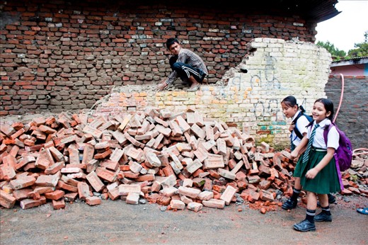 Two school girls returning home. Another subject i thought would be ideal of capturing with the demolition backdrop. The backdrop is a wall of a school that is being demolished. My title for this photo would be