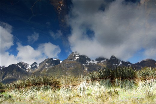 Inverse view of the highest mountains reflected in the lowest lake.