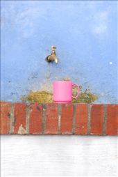 Scattered all over the streets of Chauoen are a number of drinking fountains used to cool off from the heat of the day, or to grab water for the days activities. I stumbled over a couple of them that had a cup placed on the wall waiting to be used. Obviously left there for whoever needs to quench there thirst next.

I did not move the beaker, it is exactly as found. I couldn’t resist the colour of the pink against the blue wall.: by cms79, Views[554]