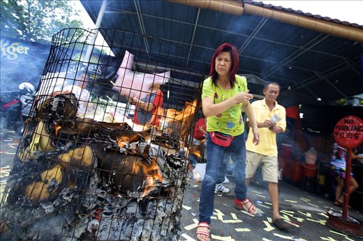 Chinese residents during Hungry Ghost Festival.
