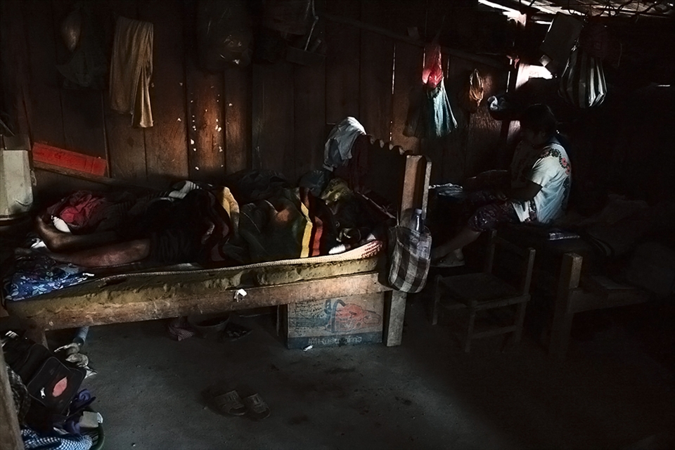 Waiting for death.

This man, 22 yo, refuses to receive medical attention. He scratch his leg with a small rock while working, but since they believe that the local clinic is where people go to die, he prefers to stay at home and wait for dead. He is father of three small children.
