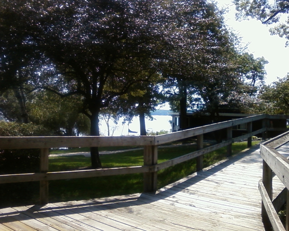 This path leads to many places, a beach in one corner and apartments on the other. A person can even find a place to sit down just around the corner and take in the scenery that this place gives you. This specific place is calming and you are able to feel the wind on your face. There are so many beautiful trees on every corner. There is nothing wrong with a little fresh air and taking a walk that will help you in the long run.