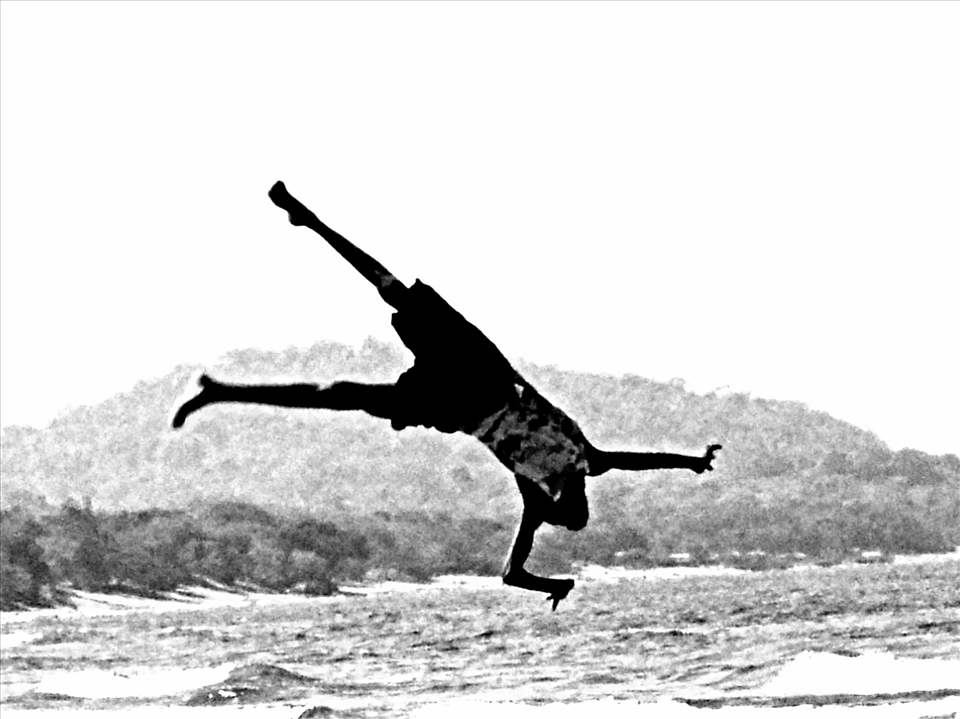 A child jumping in Lake Malawi