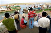 People waiting here in the Nimanti ghat, the river port of Majuli river island. Majuli river island is the cultural capital and the cradle of Assamese civilization for the past five hundred years.The satras set up preserve antiques like weapons, utensils, jewellery and other items of cultural significance.The island has been the hub of Assamese neo-Vaishnavite culture, initiated around 15th century by the revered Assamese saint Srimanta Sankardeva and his disciple Madhavdeva. Many Xatras or monasteries constructed by the saint still survive and represent the colourful Assamese culture.: by colour, Views[1213]