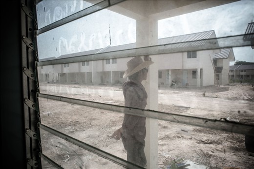 A Thai boss oversees the work at his site. Nearly all of his crew are migrants.