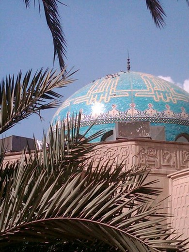 The blue-domed memorial Saddam Hussein built to honor Mikal Aflaq