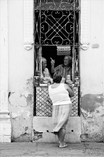 One would never get bored standing on a street in Cuba as there are just so much happening all the time. These are of neighbors interacting and catching up on daily news