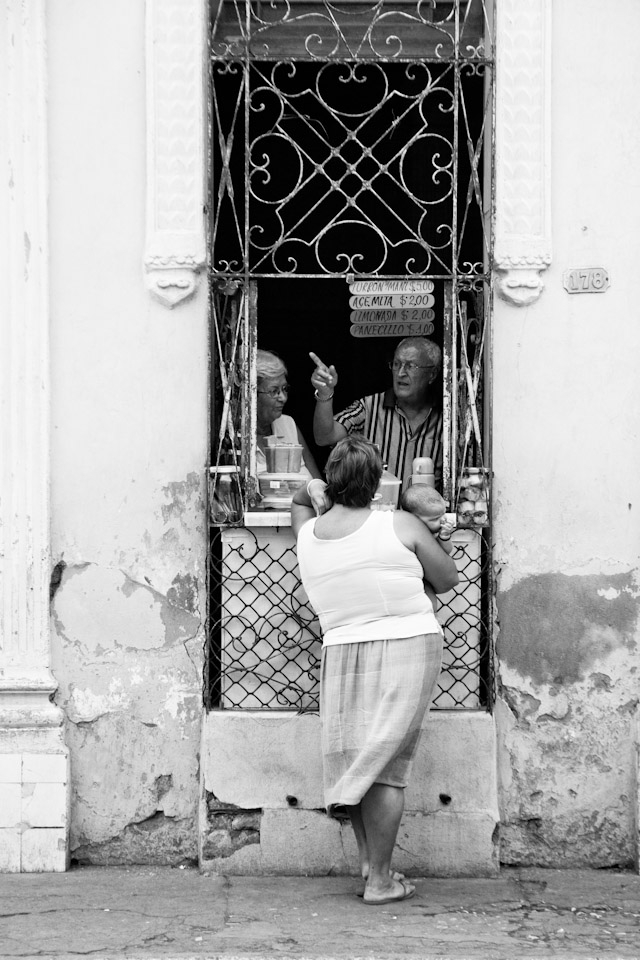 One would never get bored standing on a street in Cuba as there are just so much happening all the time. These are of neighbors interacting and catching up on daily news