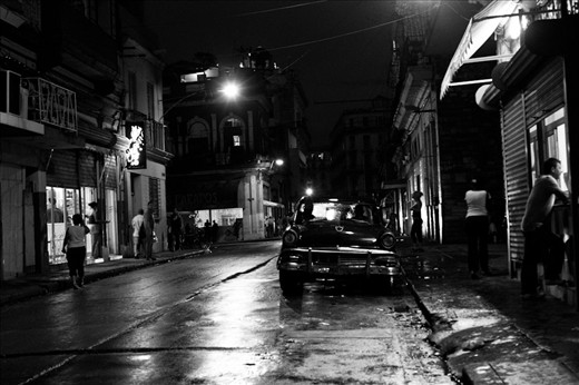 A typical street scene at night in Havana, people enjoying the balmy nights after the rain - it's just so electrifying to see all these life and interactions 