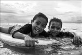 Kids playing with an old board at Nusa Lembongan Island.: by costa, Views[243]