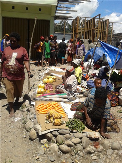 At the market, trading. 