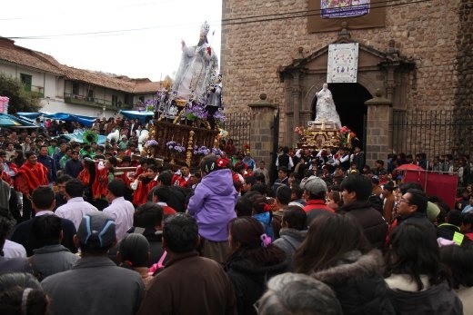 A saint returns home during the Corpus Christi celebration in Cusco.