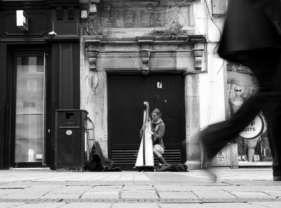 This girl usually plays the harp in the main street of Galway.