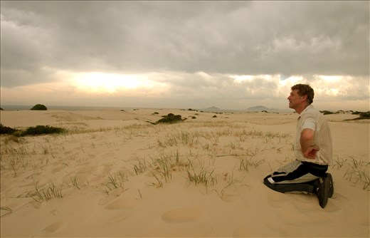 Self-portrait at Myall Lakes: I had barely realized the magnitude of the journey I had embarked on. This first evening alone, I looked ahead to the vast horizon, nothing but sand, ocean and light. There is an exhaustion, a release from years tied to a computer desk, I let go to the Gods of the Sea.