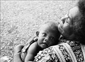 Grandmothers often take care of young ones whilst mothers work in the garden.: by crookedphotography, Views[490]
