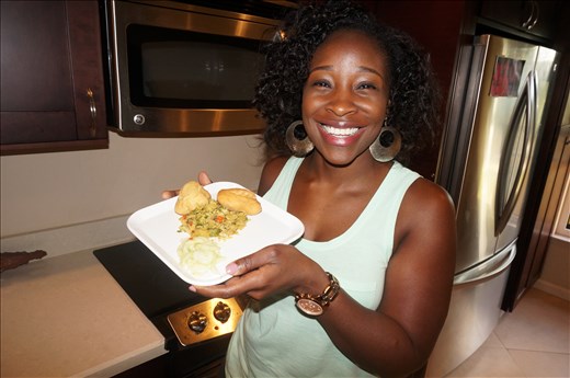 Happy girl showing off her plated dish! 