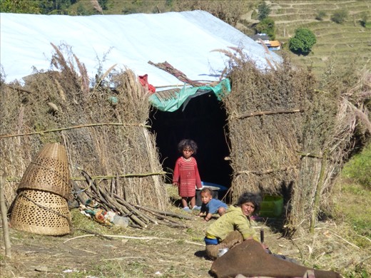 Mom and children watch another group of Trekkers amble by.