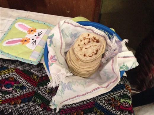 Homemade tortillas, tamales and chicken for lunch 