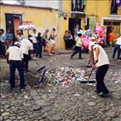 The trash guys cleaning up our carpet after processions goes by. : by cubannomad, Views[337]