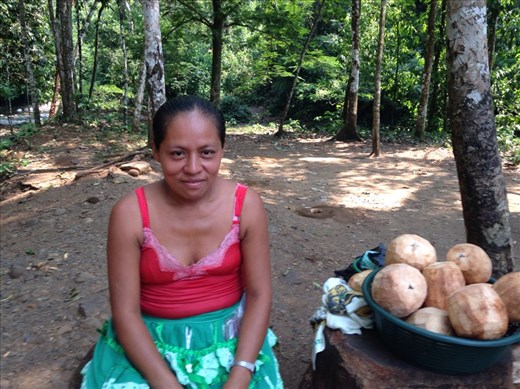 Woman selling coconut water 