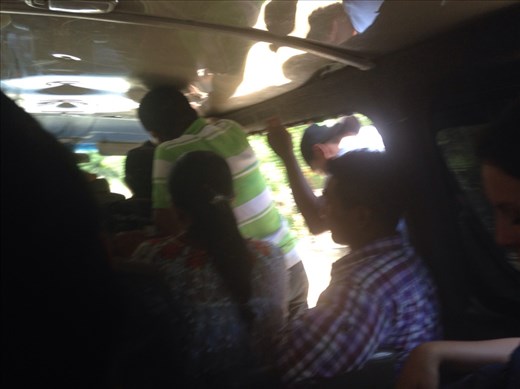 Walt, Troy and I and a Guatemalan man were crunched in the back seat.  