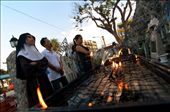 The devotees and religious lighting up candles and offering prayers in a shrine beside the cathedral.: by cyrilpaulhagios, Views[305]