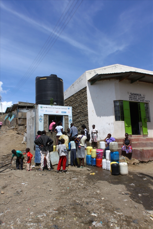 Many people buy treated water from kiosks due to high flourine in groundwater.