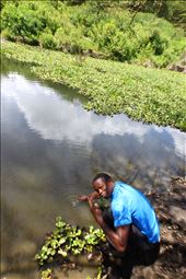 Erick, my guide, collects a water sample for me.: by czv2, Views[316]