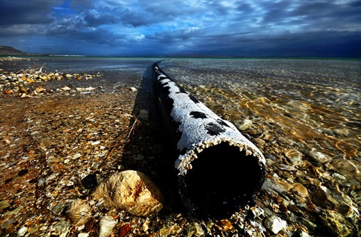 Tube - a sign the huge damage caused by the Dead Sea Factories in Israel and Jor