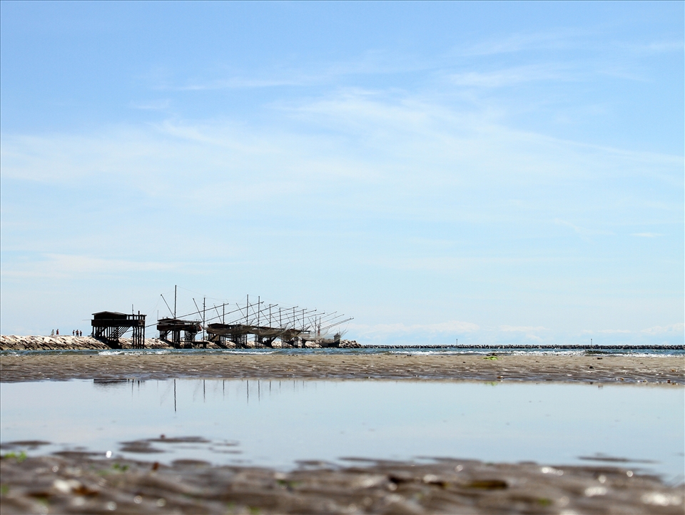 Fishing is the main activity in Chioggia; it's not only done in the lagoon and in the open sea but also along the coast. In this photo big nets, called “balanse”, are operated from inside the wooden house: they are shortly dropped under water and once pulled up fish, crabs and marine stars can be collected.