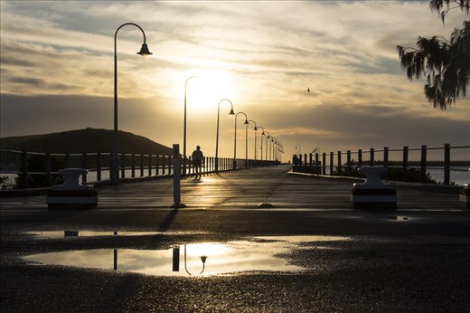 No matter the weather, you will always find life in the harbour. This man agreed that morning walks following a stormy night offer serenity and revitalisation.