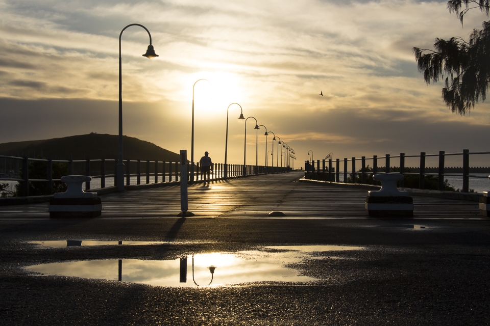 No matter the weather, you will always find life in the harbour. This man agreed that morning walks following a stormy night offer serenity and revitalisation.