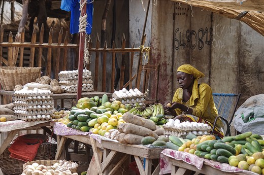 Early in the morning a vendor is waiting for first custumers