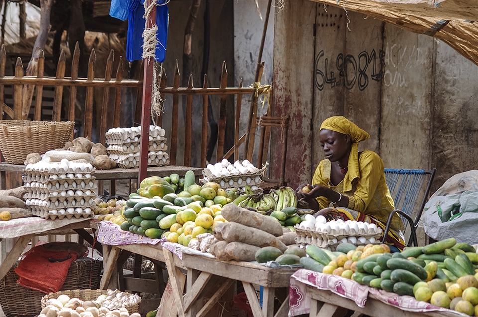 Early in the morning a vendor is waiting for first custumers