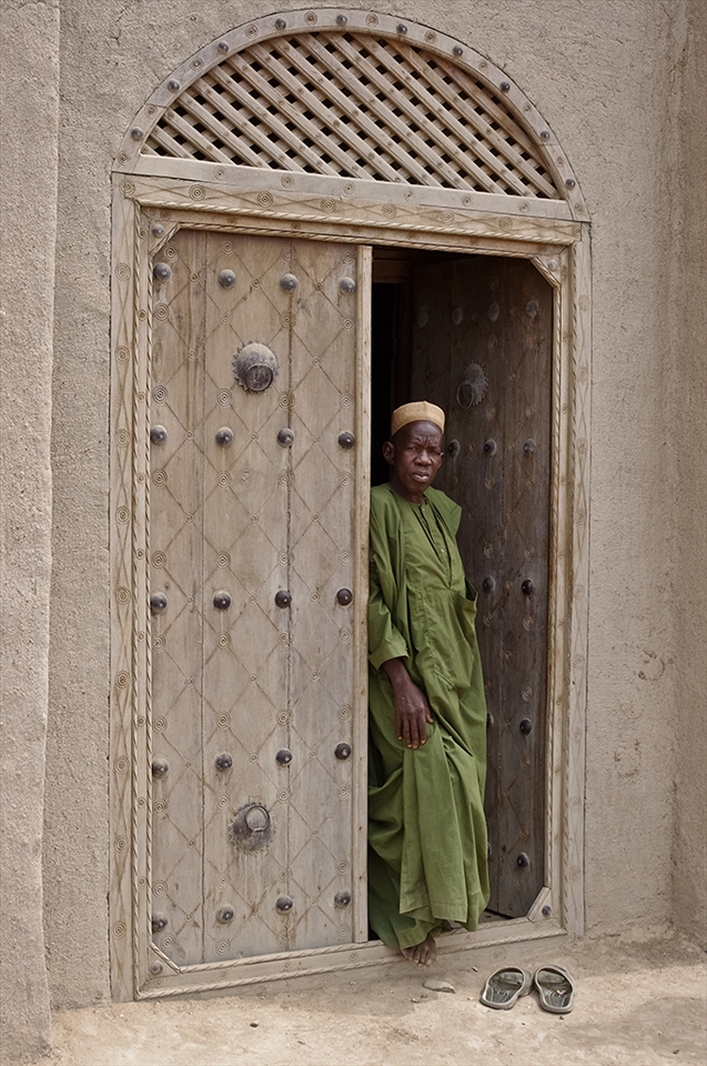Gatekeeper guarding entrance of the mosque. His eyes checks a visitor to find out if he believes in true God, if so visitor may pass to enter