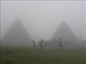 Misty playtime around the central altar in Wae Rebo, a secluded traditional mountain village in West Flores. Since there is no school in the village, the children have to attend the one in the nearest town located 4 hours walking distance from there.: by damjanr, Views[293]