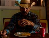 Gabriel, an undocumented immigrant farm worker eats breakfast at a bakery in a small town in New Mexico. He used to visit his family in Mexico regularly, but afraid of permanent deportation he hasn't made the trip in years.: by danaf, Views[578]