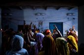 Women sing and dance in a local temple to celebrate Holi: by dangraetzer, Views[762]