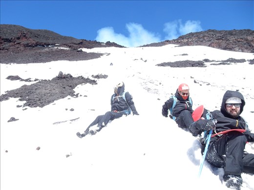 Trip down the volcano was a lot faster than the trip up. Our backpacks came complete with snow gear and a mini slide. 