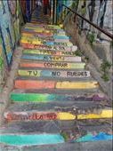 This set of stairs has lyrics to a song that go way back to when wealthy immigrants came to Valparaiso and bought up all the land leaving the locals with nothing. The songs says:
You cannot buy the wind, you cannot buy the sun and  you cannot buy the rain. 

: by danidawnandstevo, Views[463]