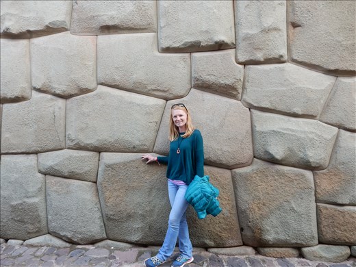 One of the few remaining walls from Inca times. Most lay under the city of Cusco or were destroyed by the Spanish. What's remarkable and still a mystery is how the huge rocks were transported 70 km and carved with such precision they didn't need mortar. 